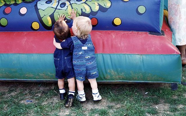 640px-Childhood_friends_at_a_carnival.jpg